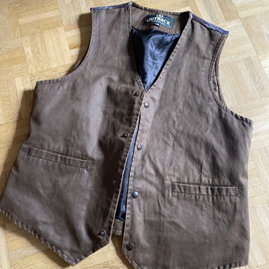 Outback-Weste aus gewachster Baumwolle braun mit blauem Muster auf der Rückseite