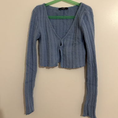 Top blu a maniche lunghe