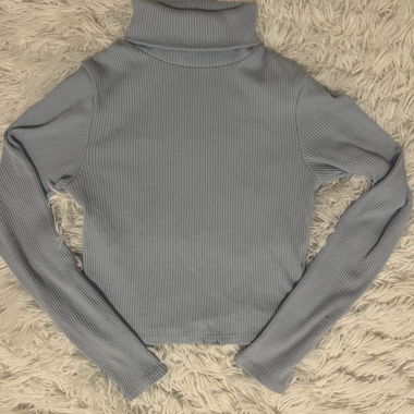 Baby blue ribbed roll-neck jumper