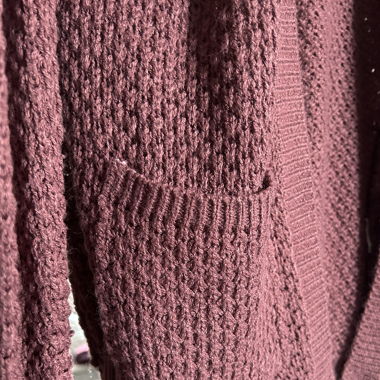 burgundy cardigan with a boho touch
