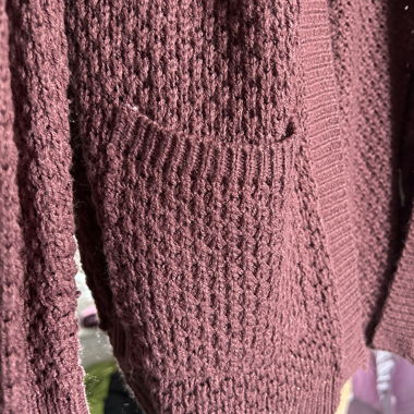 burgundy cardigan with a boho touch