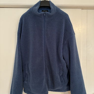 Giacca in pile blu con zip