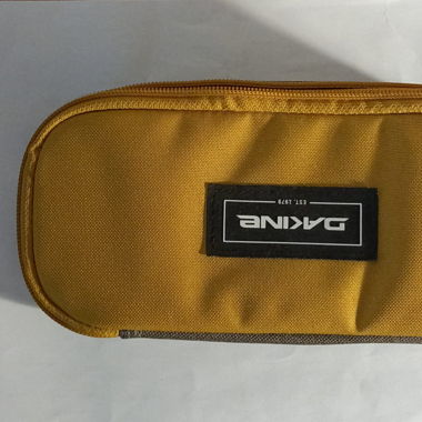 trousse jaune et grise dakine 