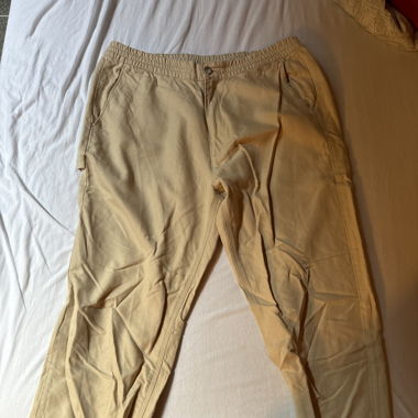 Beige, lockere Hose Lacoste