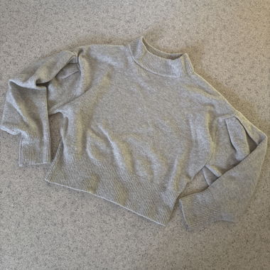 Grey knit sweater with puff sleeves