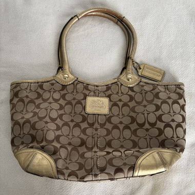 big brown & gold monogram coach shoulder bag