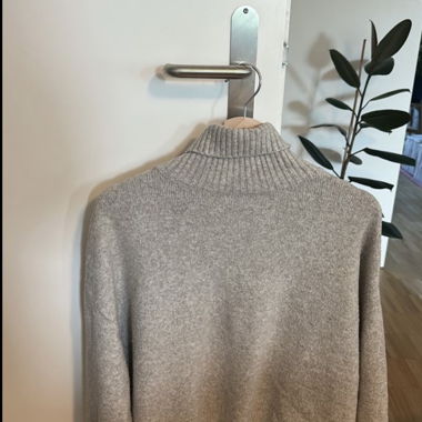 Pull à col roulé gris Oysho taille S
