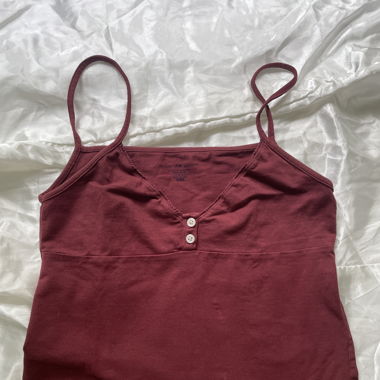 Red top with buttons 