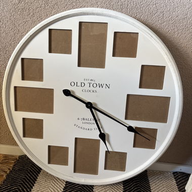 Orologio da parete con cornici per foto