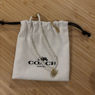 COACH pearl necklace with heart pendant