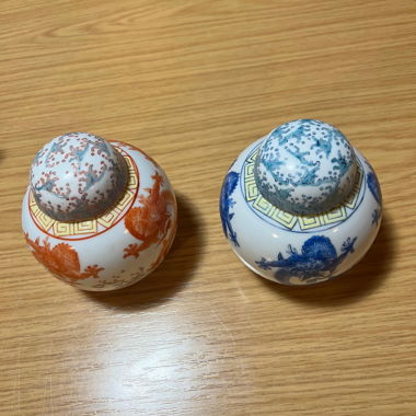 2 porcelain tea tins with dragon motif