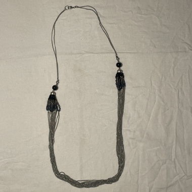 Collier long multi-rangs