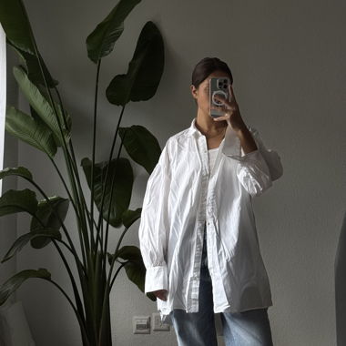 Blouse oversize blanche de Zara en taille XS.