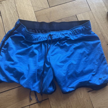 Blue Nike sport shorts