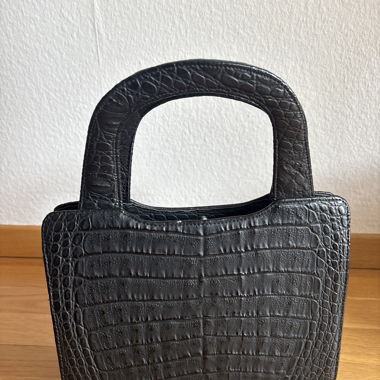 süsse Handledertasche