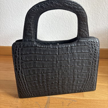 süsse Handledertasche