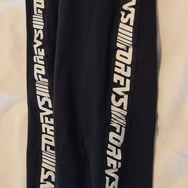 Pantaloni della tuta neri con logo 152 cm