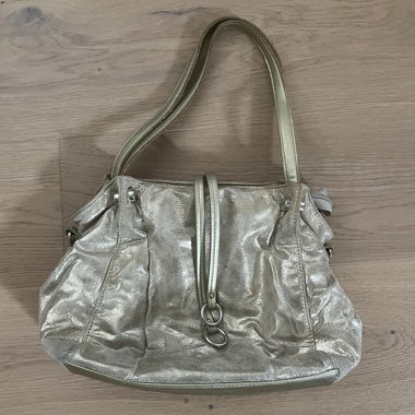 gold slouchy bag