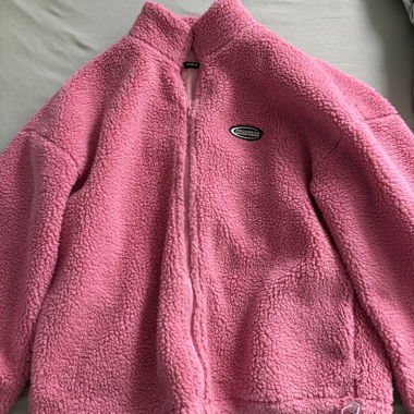 Giacca in pile rosa con zip