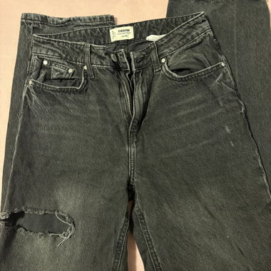 Jeans neri strappati