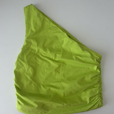Top asimmetrico verde fluo