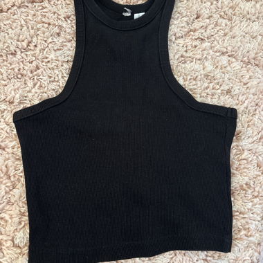 Schwarzes ärmelloses Top