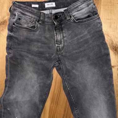 Graue Skinny Jeans