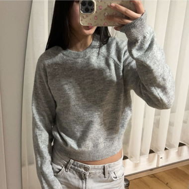 grauer strickpulli