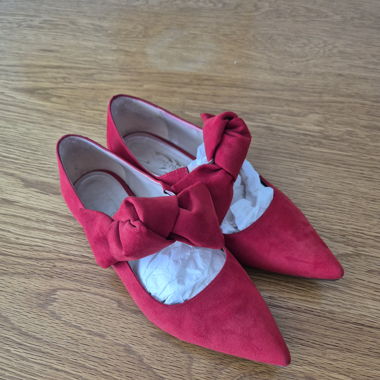 Chaussures rouges à nœuds 