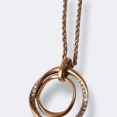 Pendentif FOSSIL couleur or rose, double anneaux