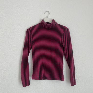 Maglia a collo alto a righe