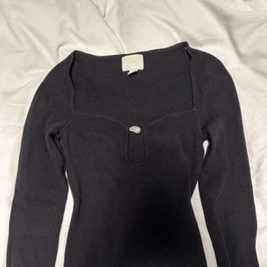 Black long sleeve with a pearl