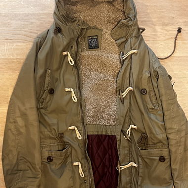 Olive-green parka with teddy lining