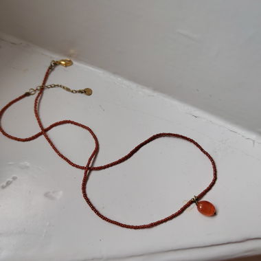 orange necklace with stone
