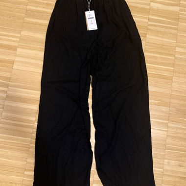 Black linen trousers, new