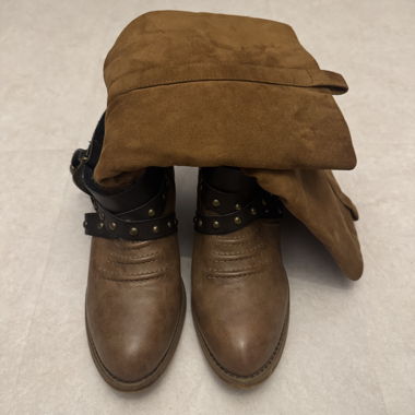 Brown cowboy-style ankle boots