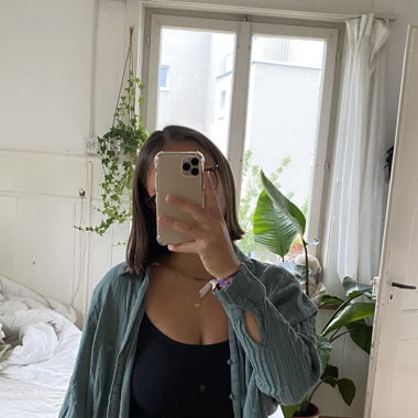 green linen blouse
