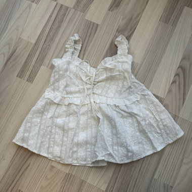 White top with tie ribbon