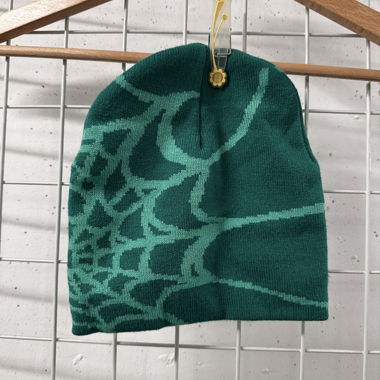 Cuffia verde con motivo astratto
