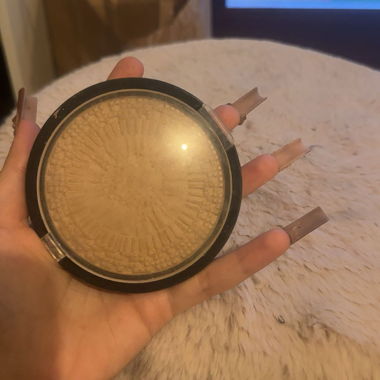 Pressed face powder compact