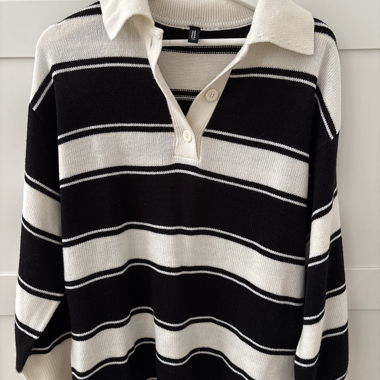 Pullover mit Knöpfe