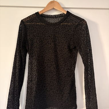 Schwarze transparente Bluse