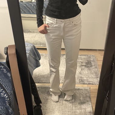Jean bootcut blanc taille haute de H&M