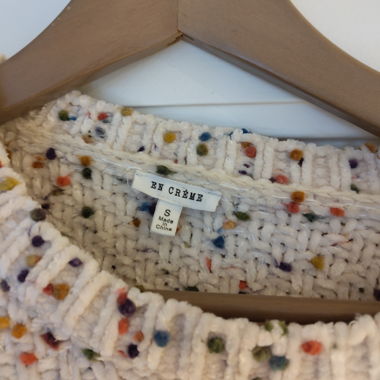 En crème maglione