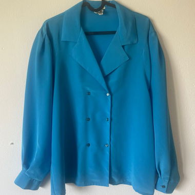 Blusa azzurra doppiopetto