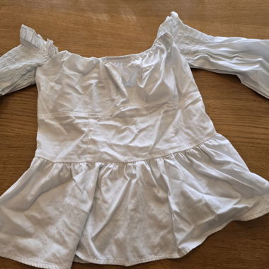 Top bianco a maniche lunghe
