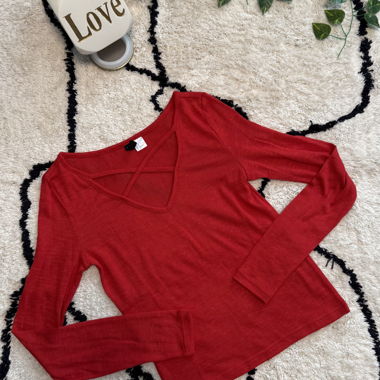 Red long-sleeve top with V-neck