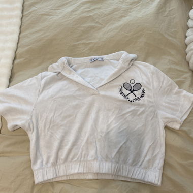 Col court blanc cropped avec motif tennis