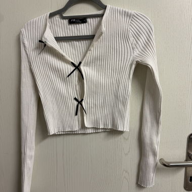 cardigan con fiocchi