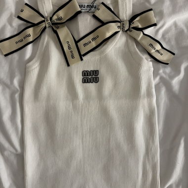 Top in maglia Miu Miu con fiocco